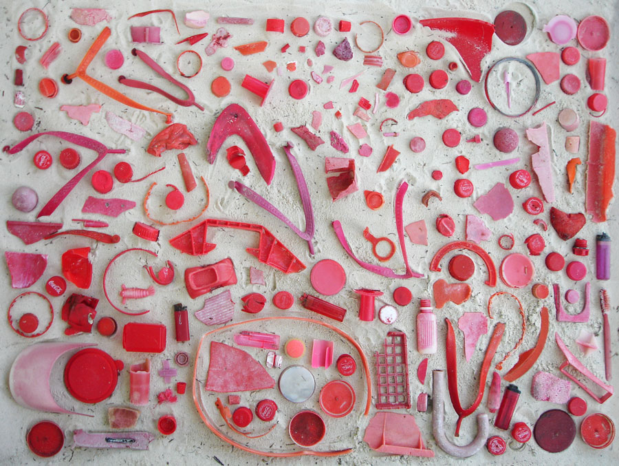 rubbish-red red plastic bits found on the beach